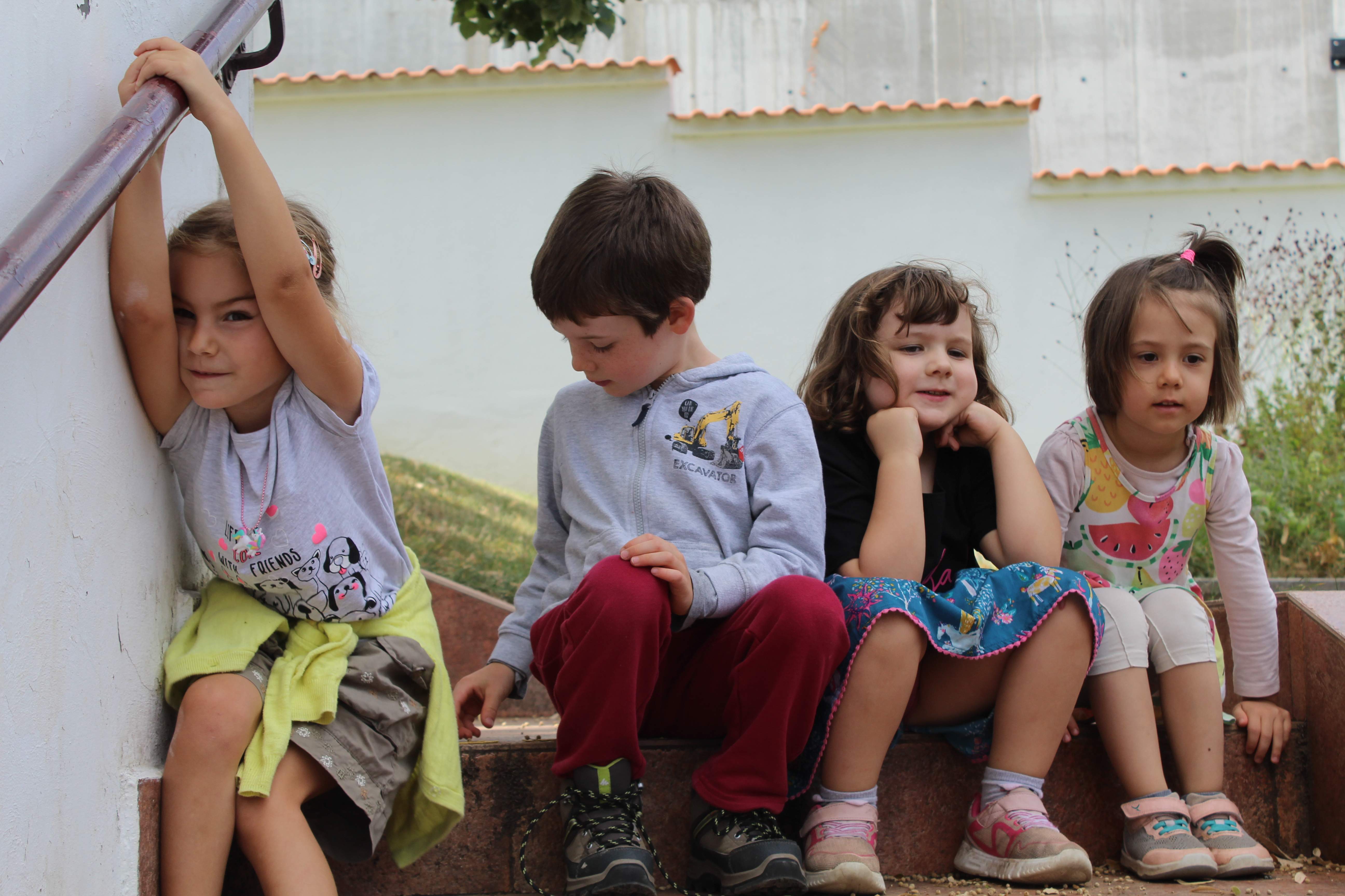 Kids sitting on stairs